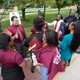 Texas Southern University students wait in the heat to enter a Democratic presidential primary debate hosted by ABC Thursday, Sept. 12, 2019, at Texas Southern University in Houston.